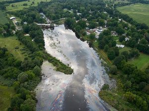 The Kalamazoo River covered in tar sands oil following the 2010 Enbridge spill. 